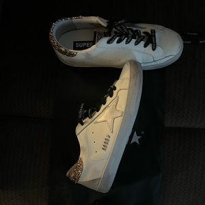 Slightly use Golden goose, fits tight on me thats why im selling